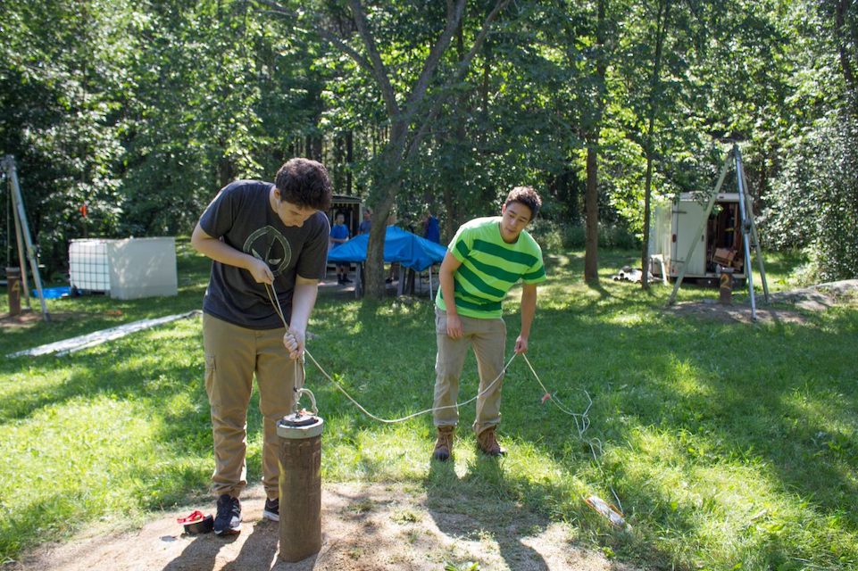 researchers doing fieldwork outside